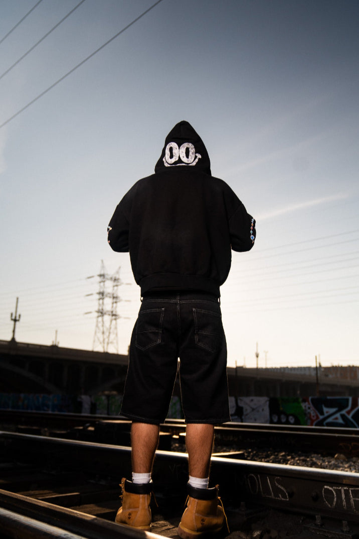 Gem Zip Up in Washed Black